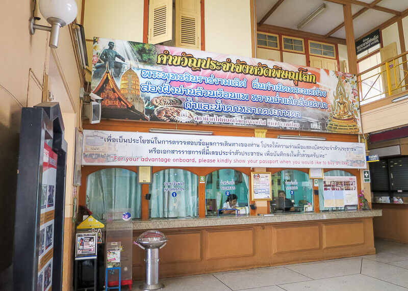 ticket counter at phitsanulok train station before boarding train to chiang mai